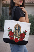 Our Lady Of Guadalupe image with 3D flower appliqués on a spacious, high-quality canvas tote bag.
