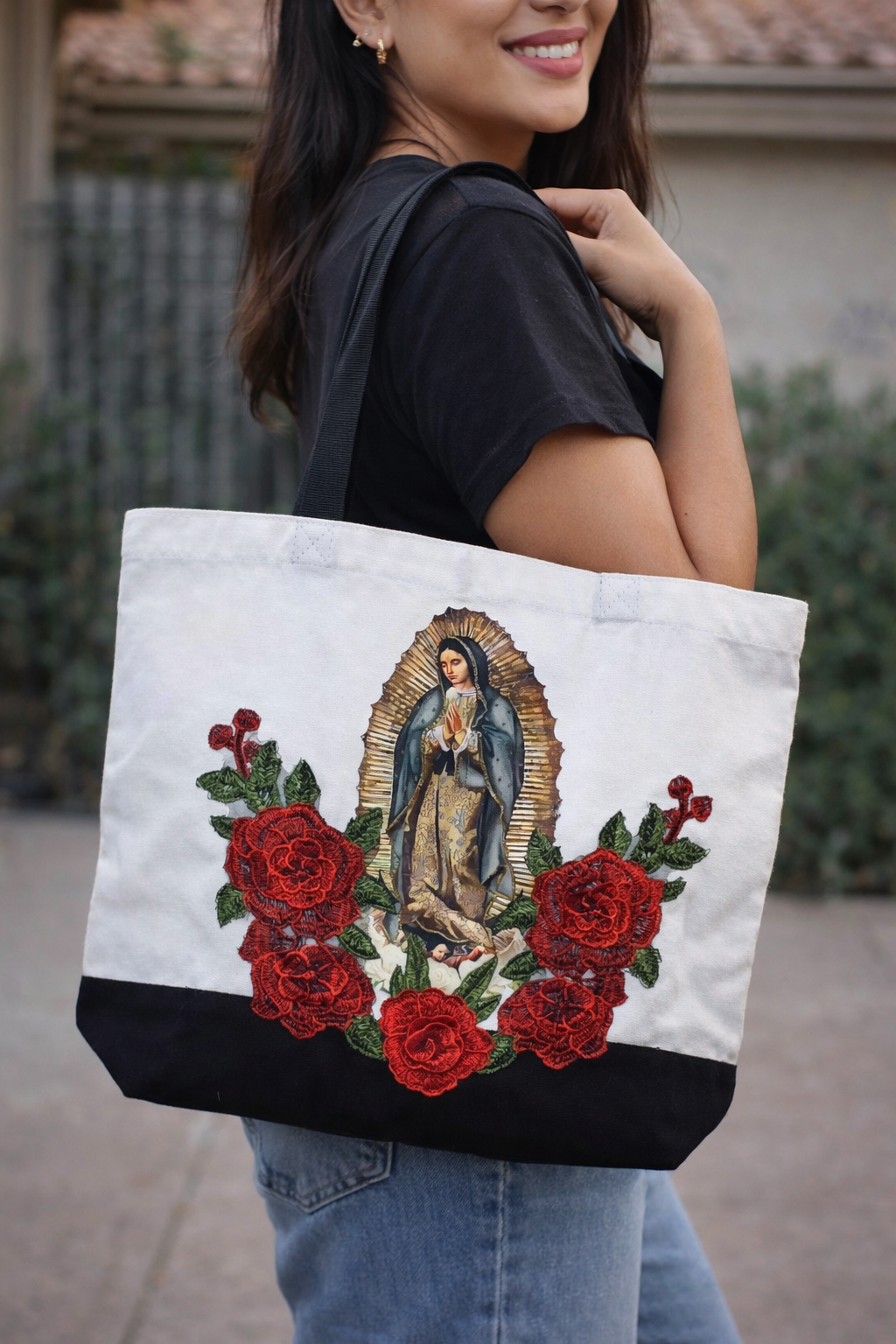 Our Lady Of Guadalupe image with 3D flower appliqués on a spacious, high-quality canvas tote bag.