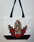 Our Lady Of Guadalupe image with 3D flower appliqués on a spacious, high-quality canvas tote bag.
